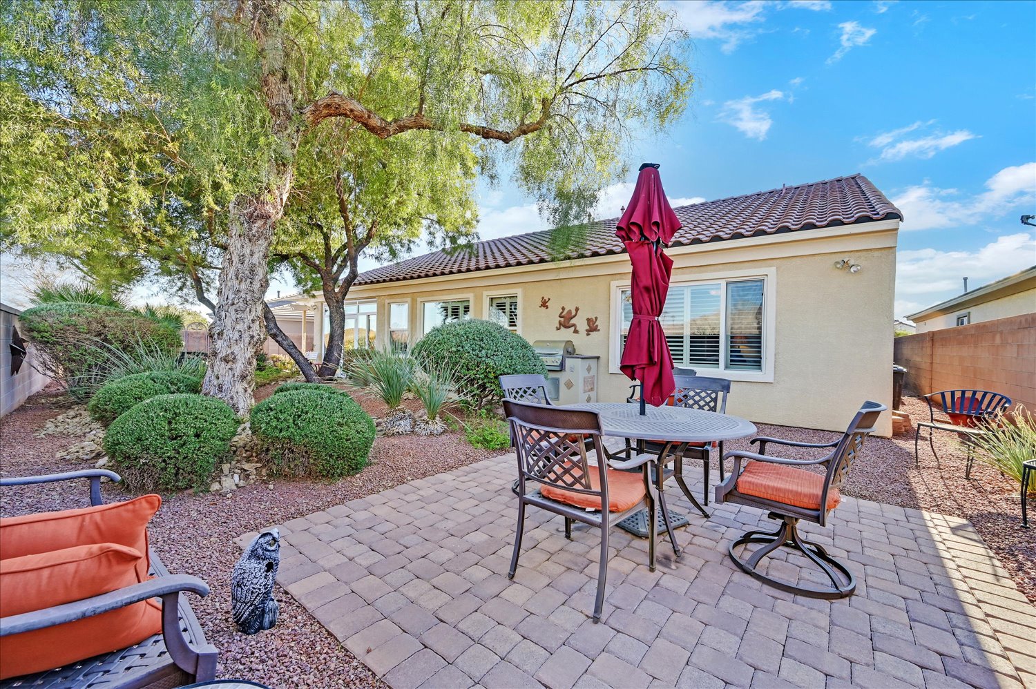Aerial corner lot view with arrow pointing to home